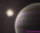 Armchair astronomers find planet in four-star system
