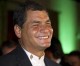 Ecuador’s re-elected Correa vows media and land reforms